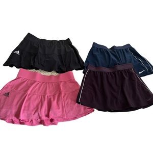 Lot of 4 tennis skirts Nike and Adidas